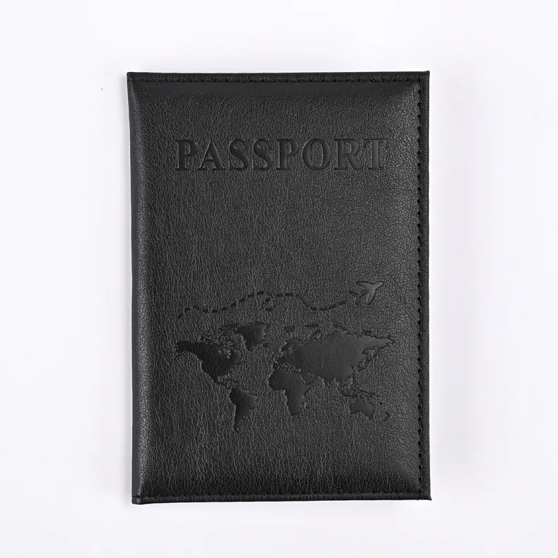 Black AeroVault premium passport holder with embossed world map and travel plane design